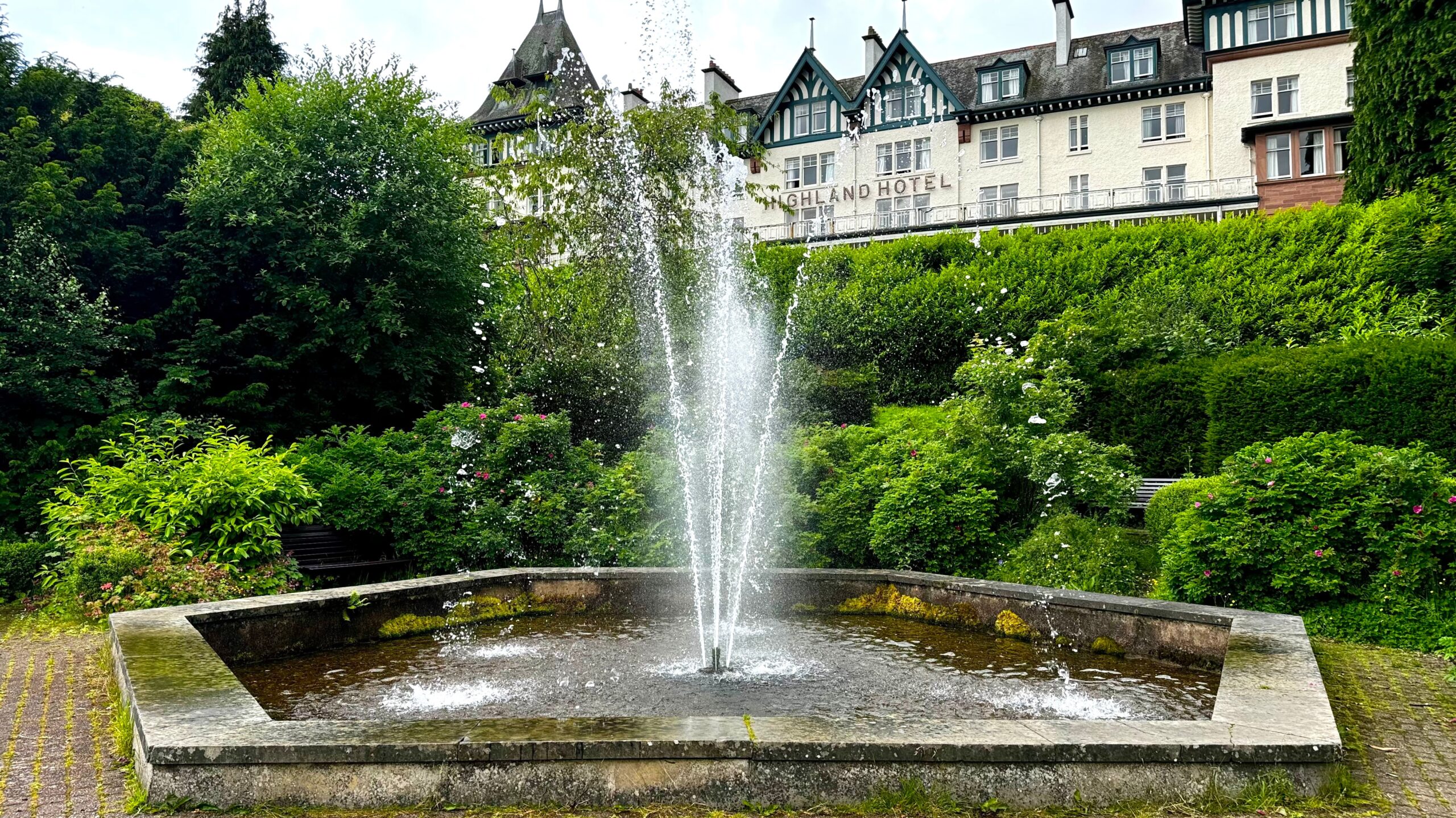 Fountain and formal gardens below the Highland Hotel in Strathpeffer.