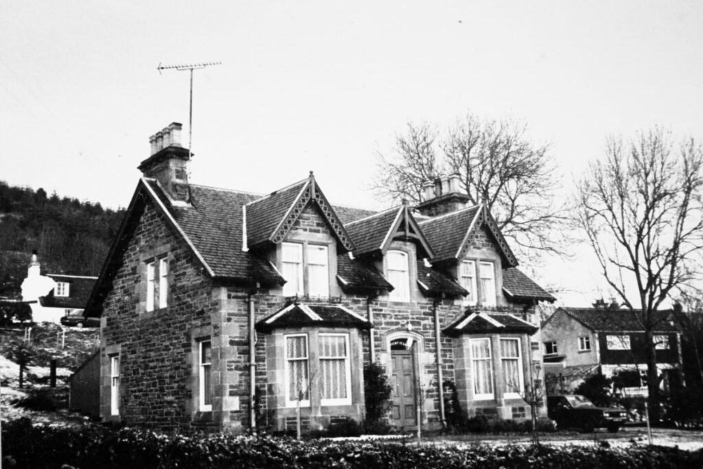 Black and white photograph of the front of Highfield House in 1975.
